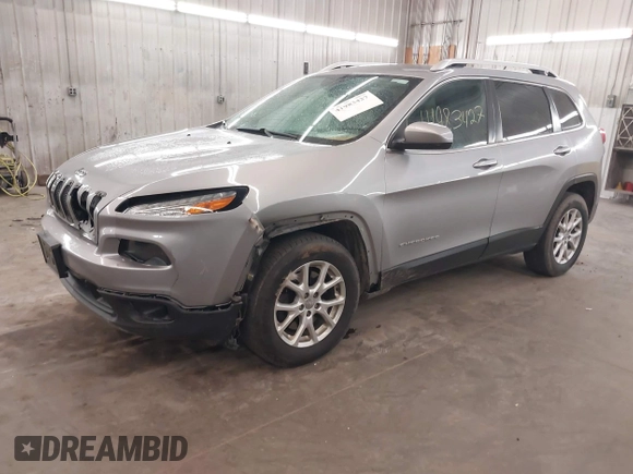 2014 Jeep Cherokee Altitude with VIN 1C4PJMCB9EW149754, listed as a IAAI auction lot 41983427 with 199,810 mi miles and . Bid and sale history available at DreamBid. Image 18.