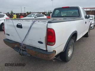 1998 Ford F-150 with VIN 1FTZF1820WKA25768, listed as a IAAI auction lot 42574710 with 206,902 mi miles and . Bid and sale history available at DreamBid. Image 4.