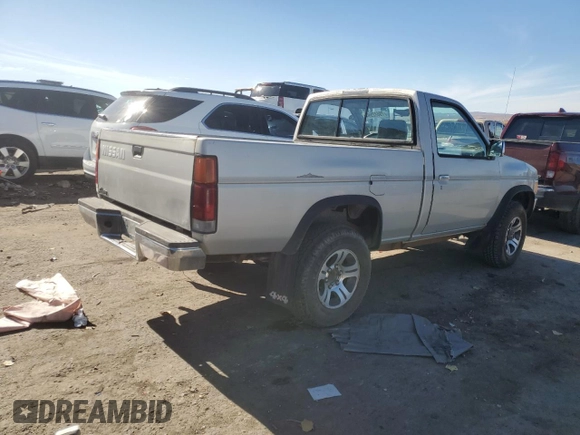1996 Nissan Frontier XE z VIN 1N6SD11Y5TC327761, wystawiony jako Copart lot #79662594 z przebiegiem 151 631 mil mil oraz Szkoda całkowita • Salvage title. Historia ofert i sprzedaży dostępna na DreamBid. Obrazek 3.