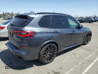 2021 BMW X5 xDrive40i with VIN 5UXCR6C06M9H65380, listed as a Copart auction lot 57445405 with 33,916 mi miles and Salvage title. Bid and sale history available at DreamBid. Image 3.