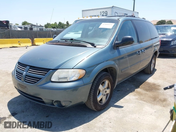 2005 Dodge Caravan SXT with VIN 2D4GP44L95R565529, listed as a IAAI auction lot 42460426 with 97,882 mi miles and . Bid and sale history available at DreamBid. Image 2.
