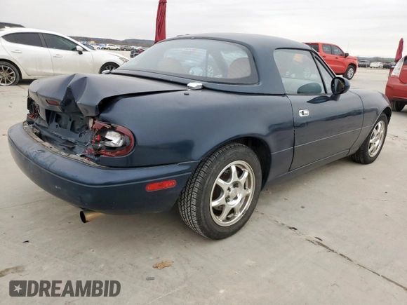1994 Mazda MX-5 Miata with VIN JM1NA3537R0512679, listed as a Copart auction lot 45649075 with 126,476 mi miles and Salvage title. Bid and sale history available at DreamBid. Image 3.