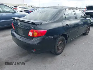 2009 Toyota Corolla with VIN 1NXBU40E59Z093650, listed as a IAAI auction lot 42121575 with 166,631 mi miles. Bid and sale history available at carsss.com. Image 4.