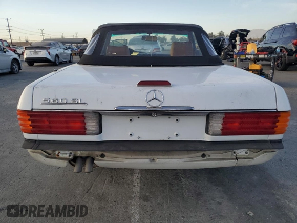 1989 Mercedes-Benz 560 Series 560SL with VIN WDBBA48D7KA100290, listed as a Copart auction lot 85049924 with 88,919 mi miles and Salvage Title. Bid and sale history available at carsss.com. Image 6.