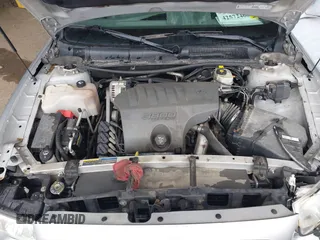 2003 Buick LeSabre Limited z VIN 1G4HR54K13U209094, wystawiony jako IAAI lot #42572460 z przebiegiem 102 970 mil mil oraz . Historia ofert i sprzedaży dostępna na DreamBid. Obrazek 10.