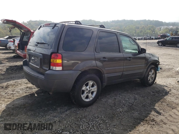 2006 Ford Escape XLT with VIN 1FMYU03Z46KD02983, listed as a Copart auction lot 74521394 with 357,594 mi miles and Salvage Title. Bid and sale history available at carsss.com. Image 3.