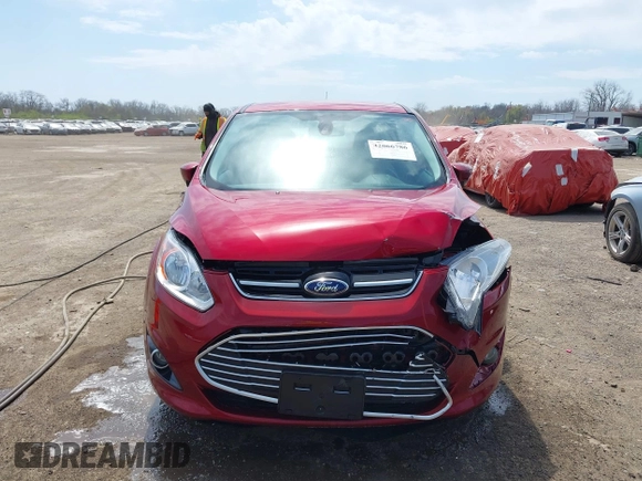 2013 Ford C-Max SEL z VIN 1FADP5BU1DL520745, wystawiony jako IAAI lot #42066786 z przebiegiem 64 213 mil mil oraz . Historia ofert i sprzedaży dostępna na DreamBid. Obrazek 6.