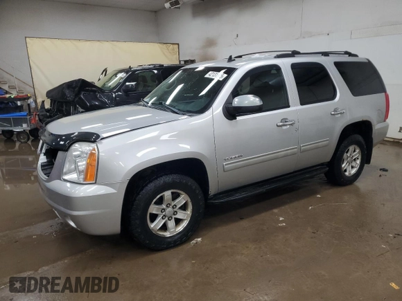 2011 GMC Yukon SLE with VIN 1GKS2AE0XBR195819, listed as a Copart auction lot 42131935 with 221,323 mi miles and Clean Title. Bid and sale history available at carsss.com. Image 1.