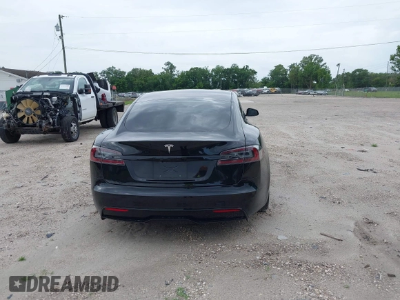 2022 Tesla Model S with VIN 5YJSA1E51NF472152, listed as a IAAI auction lot 42625943 with 60,290 mi miles and . Bid and sale history available at DreamBid. Image 15.