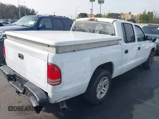 2000 Dodge Dakota Sport with VIN 1B7GL2AN8YS654014, listed as a IAAI auction lot 41470554 with 181,931 mi miles. Bid and sale history available at carsss.com. Image 4.