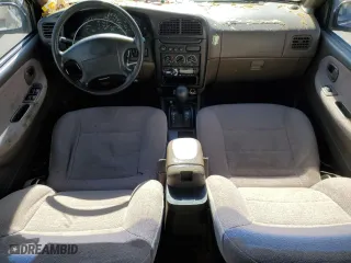1999 Kia Sportage with VIN KNDJB7231X5614082, listed as a Copart auction lot 75604744 with 130,977 mi miles and Salvage Title. Bid and sale history available at carsss.com. Image 8.