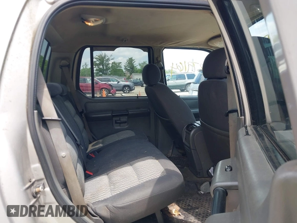 2005 Ford Explorer Sport Trac XLS z VIN 1FMZU77K55UB51889, wystawiony jako IAAI lot #42279164 z przebiegiem 210 081 mil mil oraz . Historia ofert i sprzedaży dostępna na DreamBid. Obrazek 8.