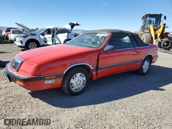 1989 Chrysler LeBaron z VIN 1C3XJ55J9KG275438, wystawiony jako Copart lot #73026764 z przebiegiem 118 347 mil mil oraz Tytuł czysty. Historia ofert i sprzedaży dostępna na DreamBid. Obrazek 1.