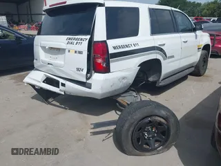 2016 Chevrolet Tahoe Commercial z VIN 1GNLCDEC9GR299693, wystawiony jako IAAI lot #42630221 z przebiegiem 127 081 mil mil oraz . Historia ofert i sprzedaży dostępna na DreamBid. Obrazek 21.