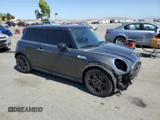 2012 MINI Hardtop S with VIN WMWSV3C57CTY16657, listed as a Copart auction lot 62812445 with 122,796 mi miles and Salvage title. Bid and sale history available at DreamBid. Image 4.