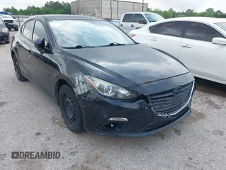 2014 Mazda 3 i Sport with VIN JM1BM1K70E1194298, listed as a IAAI auction lot 42048040 with 232,972 mi miles. Bid and sale history available at carsss.com. Image 1.