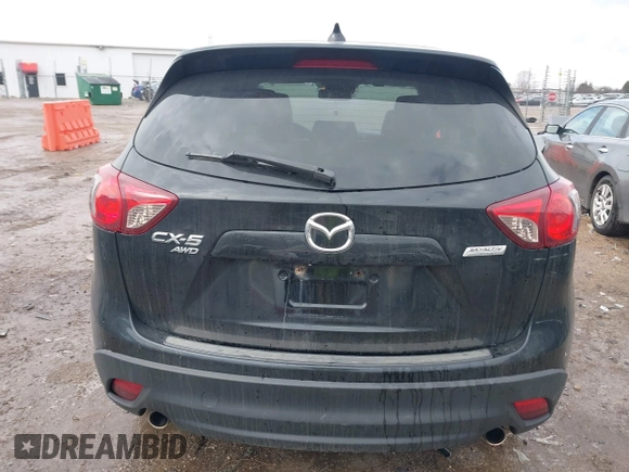 2014 Mazda CX-5 Grand Touring with VIN JM3KE4DY5E0373731, listed as a IAAI auction lot 41517852 with 148,414 mi miles. Bid and sale history available at carsss.com. Image 16.
