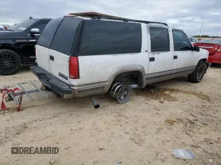 1999 Chevrolet Suburban with VIN 1GNEC16R7XJ418169, listed as a Copart auction lot 88995495 with 2,015,240 mi miles and Salvage title. Bid and sale history available at DreamBid. Image 3.