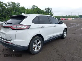 2015 Ford Edge SE z VIN 2FMTK4G87FBC18076, wystawiony jako IAAI lot #42536718 z przebiegiem 180 790 mil mil oraz . Historia ofert i sprzedaży dostępna na DreamBid. Obrazek 4.