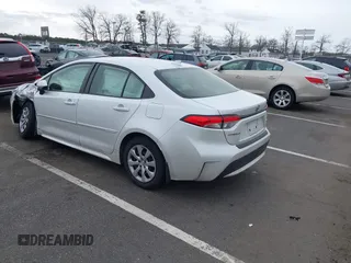 2022 Toyota Corolla LE with VIN JTDEPMAEXN3011631, listed as a IAAI auction lot 41727267 with 64,145 mi miles and . Bid and sale history available at DreamBid. Image 3.