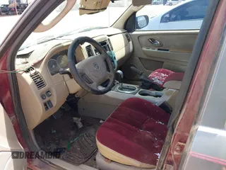 2006 Mercury Mariner Convenience with VIN 4M2YU56ZX6DJ04338, listed as a IAAI auction lot 42564945 with 99,570 mi miles and . Bid and sale history available at DreamBid. Image 5.