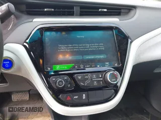 2020 Chevrolet Bolt EV Premier with VIN 1G1FZ6S03L4128822, listed as a IAAI auction lot 42708559 with 38,411 mi miles and . Bid and sale history available at DreamBid. Image 18.