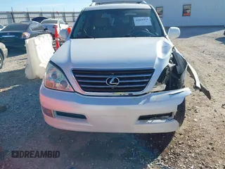 2009 Lexus GX 470 z VIN JTJBT20X390175930, wystawiony jako IAAI lot #41856945 z przebiegiem 207 809 mil mil oraz . Historia ofert i sprzedaży dostępna na DreamBid. Obrazek 12.