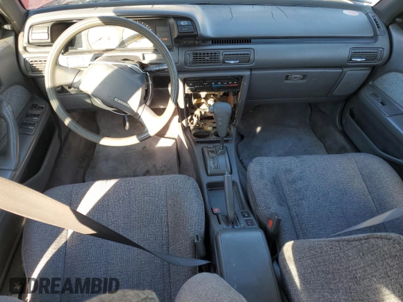 1990 Toyota Camry z VIN JT2SV21E7L3411990, wystawiony jako Copart lot #88557555 z przebiegiem 335 803 mil mil oraz Szkoda całkowita • Salvage title. Historia ofert i sprzedaży dostępna na DreamBid. Obrazek 8.