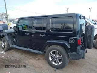 2016 Jeep Wrangler Unlimited 75th Anniversary with VIN 1C4BJWEG1GL221873, listed as a IAAI auction lot 41635788 with 148,493 mi miles. Bid and sale history available at carsss.com. Image 15.