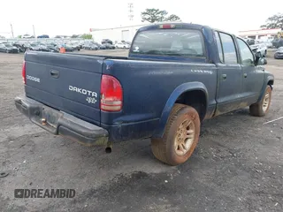 2004 Dodge Dakota Sport with VIN 1D7HL38K34S782067, listed as a IAAI auction lot 42012642 with 113,921 mi miles. Bid and sale history available at carsss.com. Image 4.