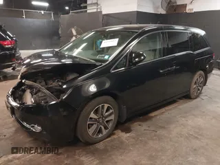 2014 Honda Odyssey Touring with VIN 5FNRL5H94EB105745, listed as a IAAI auction lot 41744012 with 77,032 mi miles and . Bid and sale history available at DreamBid. Image 17.