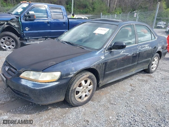 2002 Honda Accord Sdn SE with VIN 1HGCG66852A019330, listed as a IAAI auction lot 41984581 with 229,533 mi miles. Bid and sale history available at carsss.com. Image 2.