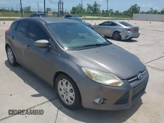 2012 Ford Focus SE z VIN 1FAHP3K20CL190373, wystawiony jako IAAI lot #42288412 z przebiegiem 160 206 mil mil oraz . Historia ofert i sprzedaży dostępna na DreamBid. Obrazek 1.