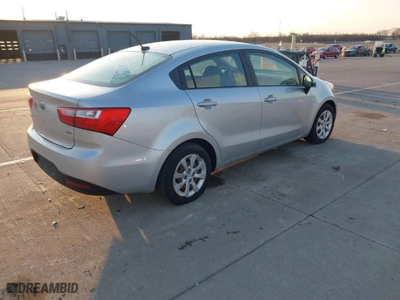 2012 Kia Rio LX with VIN KNADM4A35C6055936, listed as a IAAI auction lot 41787094 with 131,930 mi miles. Bid and sale history available at carsss.com. Image 4.