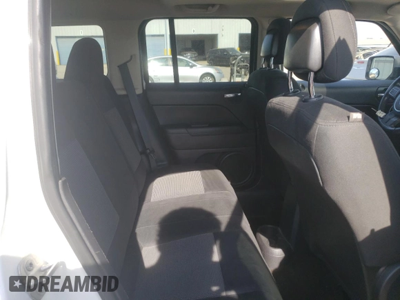 2014 Jeep Patriot Latitude с VIN 1C4NJRFB6ED792039, выставлен на аукционе Copart как лот 63076565 с пробегом 215 522 миль миль и Списание • Salvage title. История ставок и продаж доступна на DreamBid. Изображение 11.