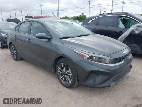 2024 Kia Forte LXS with VIN 3KPF24AD9RE767959, listed as a IAAI auction lot 42037956 with 29,130 mi miles. Bid and sale history available at carsss.com. Image 1.