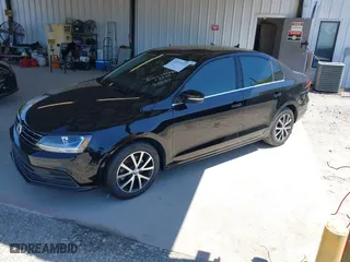 2018 Volkswagen Jetta 1.4T SE with VIN 3VWDB7AJ5JM261387, listed as a IAAI auction lot 42034369 with 63,725 mi miles. Bid and sale history available at carsss.com. Image 17.