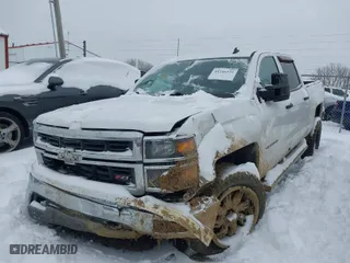 2014 Chevrolet Silverado 1500 LT with VIN 3GCUKREC3EG347070, listed as a IAAI auction lot 41246225 with 180,446 mi miles. Bid and sale history available at carsss.com. Image 2.