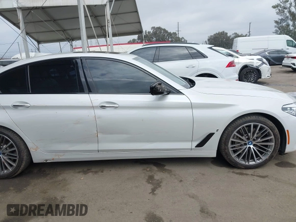 2018 BMW 5 Series 530e with VIN WBAJA9C5XJB033667, listed as a IAAI auction lot 42107936 with 55,753 mi miles and . Bid and sale history available at DreamBid. Image 14.