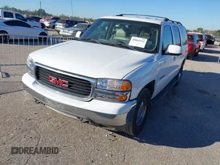 2001 GMC Yukon XL SLT with VIN 3GKEC16TX1G265630, listed as a IAAI auction lot 40869322 with 284,692 mi miles. Bid and sale history available at carsss.com. Image 2.