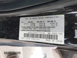 2015 Mazda 6 i Touring with VIN JM1GJ1V67F1174536, listed as a IAAI auction lot 41823441 with 100,264 mi miles. Bid and sale history available at carsss.com. Image 9.