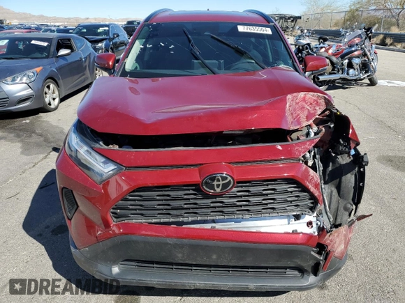 2022 Toyota RAV4 XLE with VIN JTMW1RFV0ND095383, listed as a Copart auction lot 77635504 with 30,886 mi miles and Salvage Title. Bid and sale history available at carsss.com. Image 5.