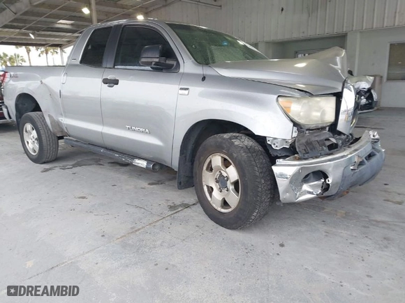 2007 Toyota Tundra SR5 with VIN 5TBBT541X7S453008, listed as a IAAI auction lot 41380611 with 153,181 mi miles. Bid and sale history available at carsss.com. Image 1.