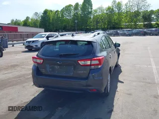 2018 Subaru Impreza Premium with VIN 4S3GTAD60J3705407, listed as a IAAI auction lot 42109867 with 74,014 mi miles and . Bid and sale history available at DreamBid. Image 4.