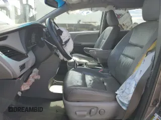2015 Toyota Sienna XLE with VIN 5TDYK3DC5FS643985, listed as a Copart auction lot 56956505 with 179,131 mi miles and Salvage title. Bid and sale history available at DreamBid. Image 7.