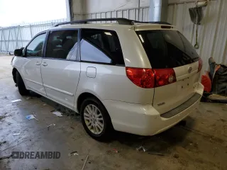 2010 Toyota Sienna XLE with VIN 5TDYK4CC5AS331083, listed as a Copart auction lot 52560595 with 0 mi miles and Non Repairable. Bid and sale history available at carsss.com. Image 2.