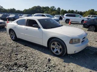 2009 Dodge Charger Police with VIN 2B3KA43T79H571238, listed as a Copart auction lot 71101974 with 138,234 mi miles and Salvage Title. Bid and sale history available at carsss.com. Image 4.