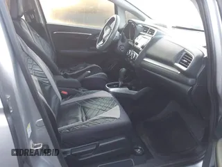 2015 Honda Fit LX with VIN 3HGGK5H5XFM731533, listed as a IAAI auction lot 41601419 with 53,922 mi miles. Bid and sale history available at carsss.com. Image 5.