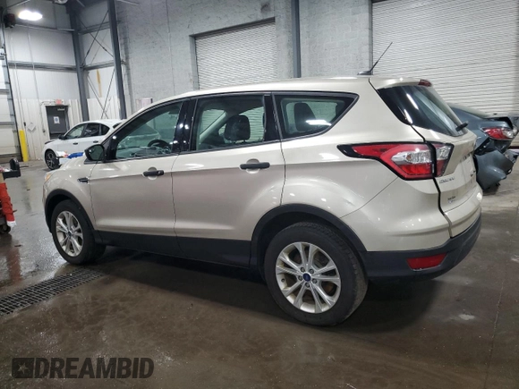 2017 Ford Escape S with VIN 1FMCU0F79HUC26012, listed as a Copart auction lot 65235285 with 98,682 mi miles and Salvage title. Bid and sale history available at DreamBid. Image 2.