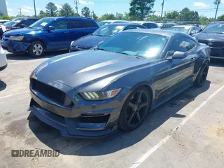 2015 Ford Mustang EcoBoost z VIN 1FA6P8TH5F5351476, wystawiony jako IAAI lot #42157688 z przebiegiem 134 131 mil mil oraz . Historia ofert i sprzedaży dostępna na DreamBid. Obrazek 2.